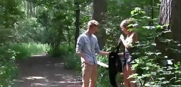  Young guy fucks an adult lady with beautiful boobs right in the forest